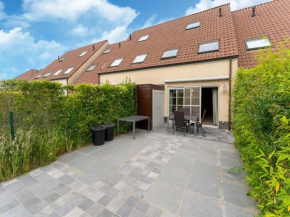 Nice holiday home in De Haan with carport